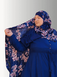 Lavender Twilight Bloom Hijab from the Luxe Harmony Collection, featuring a deep navy blue chiffon base adorned with soft lavender floral details, paired with a comfortable jersey lining.Designed by Maida's Hijab World 
