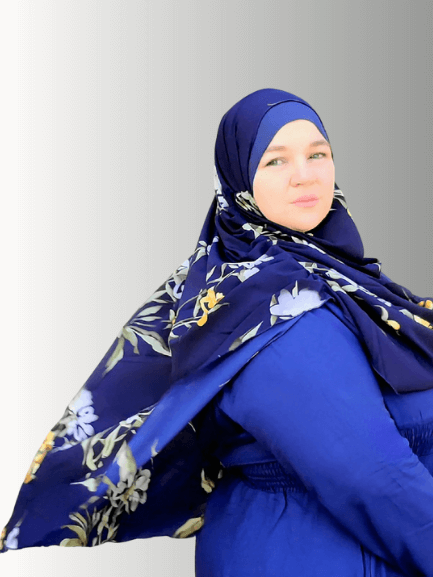 A stylish instant double-loop hijab named Midnight Garden Veil, featuring a navy blue base with floral patterns in white, yellow, and sage green tones, designed for effortless styling and all-day comfort.
