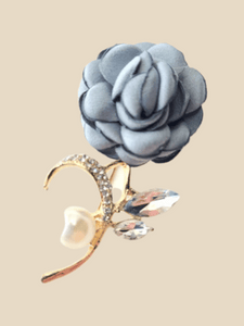 Gray rose hijab pin with gold and pearl details 