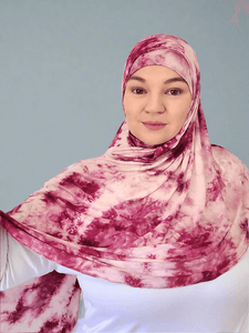 Berry Marble an instant hijab made of soft jersey material deep shades of magenta pink blend with light pink & white adding a marble effect.  